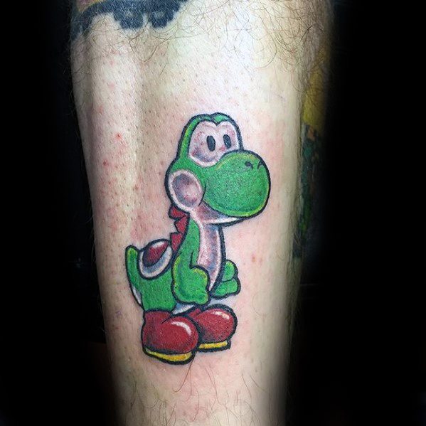 Guy With Yoshi Tattoo Design On Outer Forearm