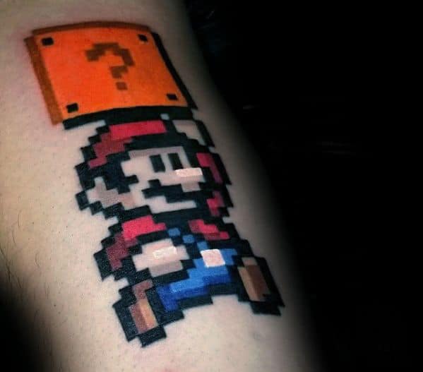 Guys 8 Bit Mario Tattoo On Arm