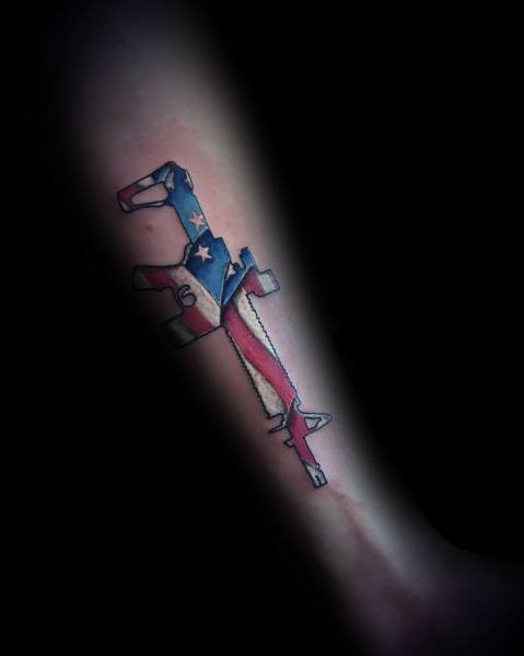 AR-15 tattoo with an American flag design, featuring red, white, and blue colors with stars, symbolizing patriotism and Second Amendment rights.