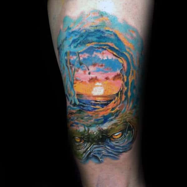 Guys Arms Evil Eyes Sunset Over Surf Tattoo