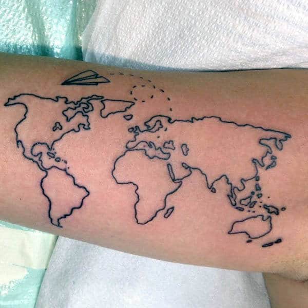 World map tattoo with an intricate airplane design on someone's forearm