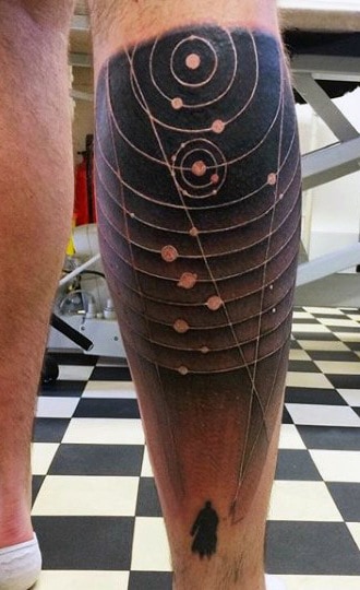 Guy's Back Of Leg Astronomy Tattoo