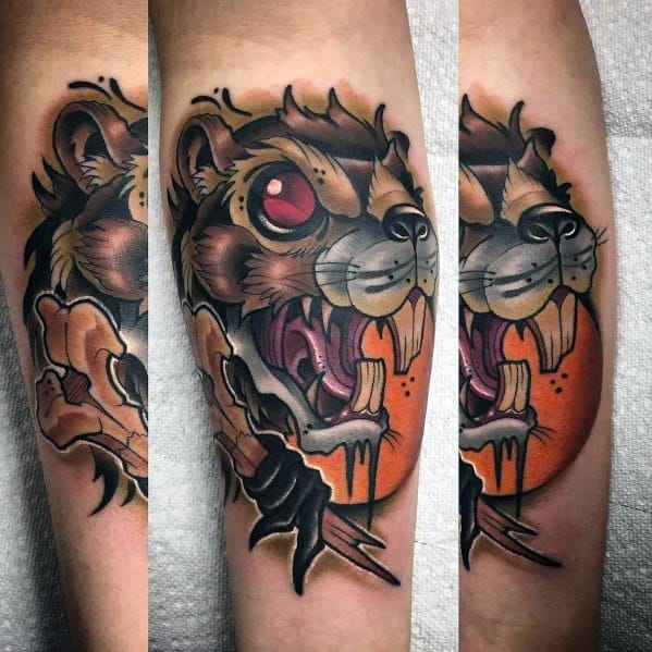 Fierce beaver tattoo with sharp teeth, glowing red eye, and dripping orange moon backdrop, featuring a bone-clutching claw in bold style.