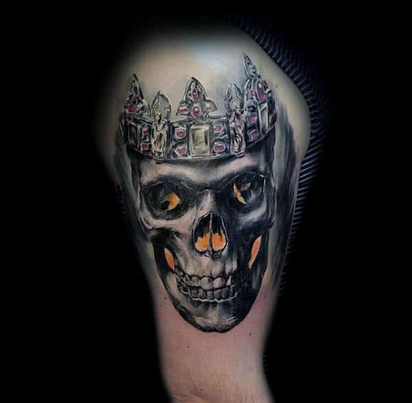 Guys Biceps Skull With Bejewelled Crown Tattoo