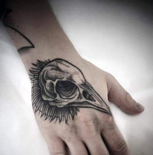Guys Bird Skull Hand Tattoos