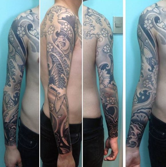 Guy's Black And White Koi Fish Tattoo