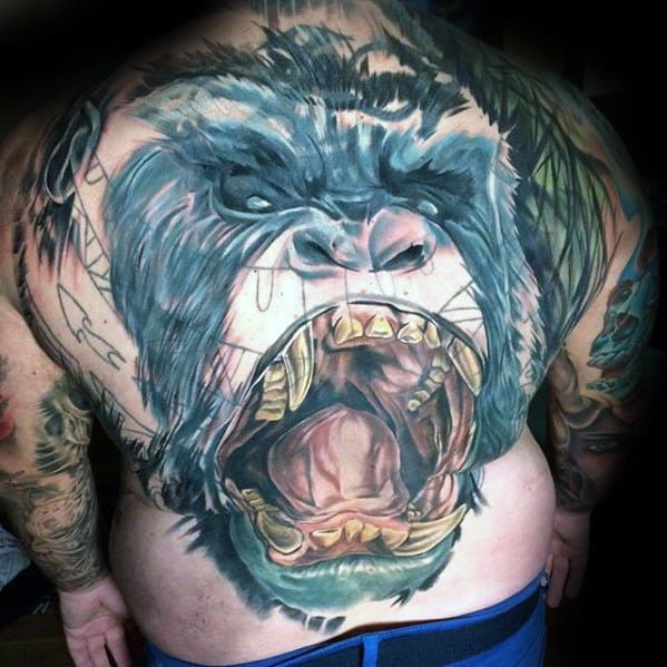 Blast over back tattoo of a roaring gorilla with detailed fur and sharp teeth