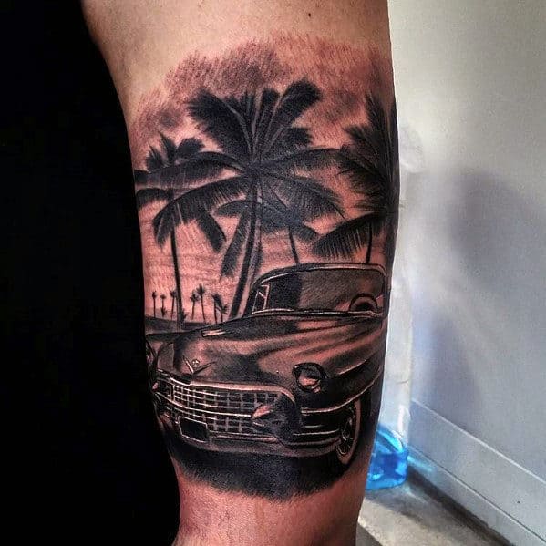 Guys Cadillac Car With Beach Scene Quarter Sleeve Tattoo