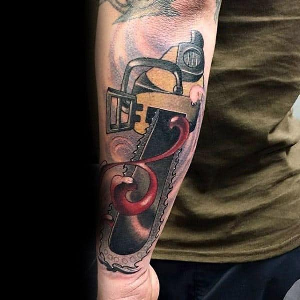 Chainsaw tattoo with a dark blade and swirling red tentacles, blending horror and surreal elements on the forearm.