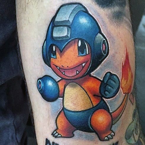 Unique tattoo of Charmander dressed as Mega Man, featuring a blue helmet and armor with a confident pose and fiery tail.
