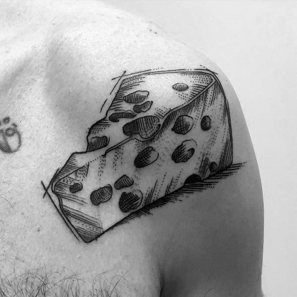 Detailed black and gray tattoo of a Swiss cheese wedge on the shoulder, featuring fine linework and shading for a realistic, sketch-like effect.
