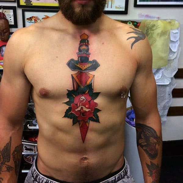 Guys Chest Dagger Into Rose Tattoo