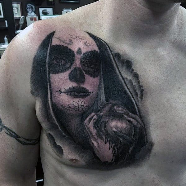 Guys Chest Day Of The Dead Tattoo With Female Holding Heart