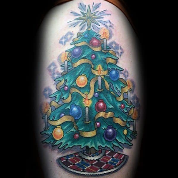 Colorful Christmas tree tattoo with glowing candles, ornaments, golden ribbon, and a bright star on top, creating a classic holiday design.