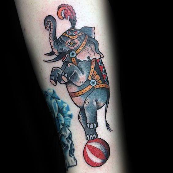 Guys Circus Tattoo With Elephant Design On Forearm