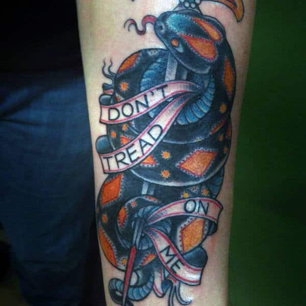 Guys Colorful Forearm Tattoo Of Coiled Snake And Dont Tread On Me Text