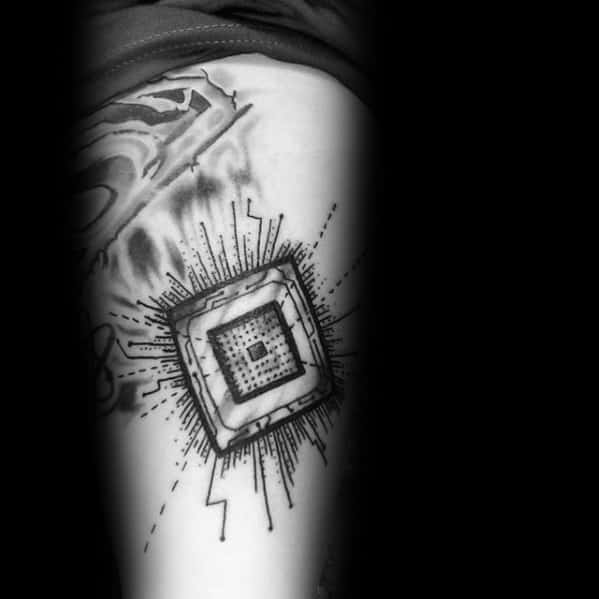 Tattoo of a microchip bursting with detailed circuit lines and shaded effects, placed on the upper arm for a high-tech look.