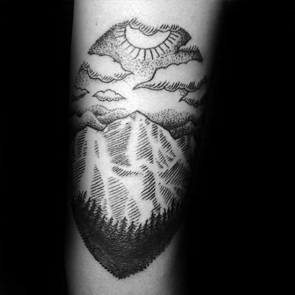 Dotwork mountain tattoo with a sun, clouds, and pine trees, capturing the beauty of nature and the spirit of adventure.
