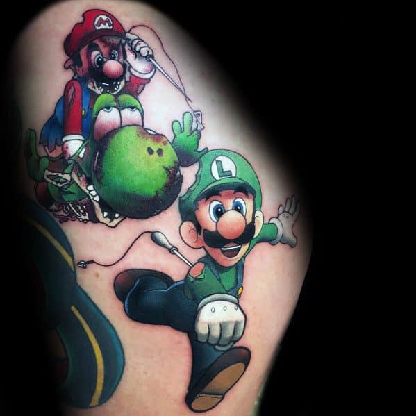 Detailed tattoo of Luigi running in the foreground, with a distressed Mario and Yoshi controlled like puppets in the background.