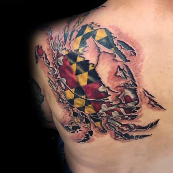 Maryland flag tattoo featuring a detailed blue crab with a torn skin effect on the back, symbolizing state pride and coastal heritage.