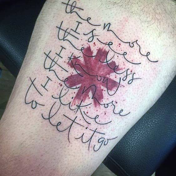 Tattoo featuring the Red Hot Chili Peppers logo with flowing handwritten script overlay, creating an artistic and lyrical design with a watercolor effect.