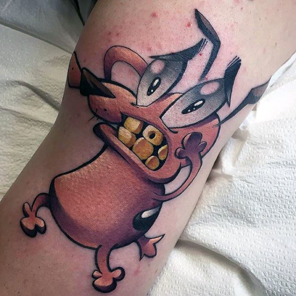 Realistic-style tattoo of Courage the Cowardly Dog with a terrified expression, raised arms, and detailed shading on the upper thigh.