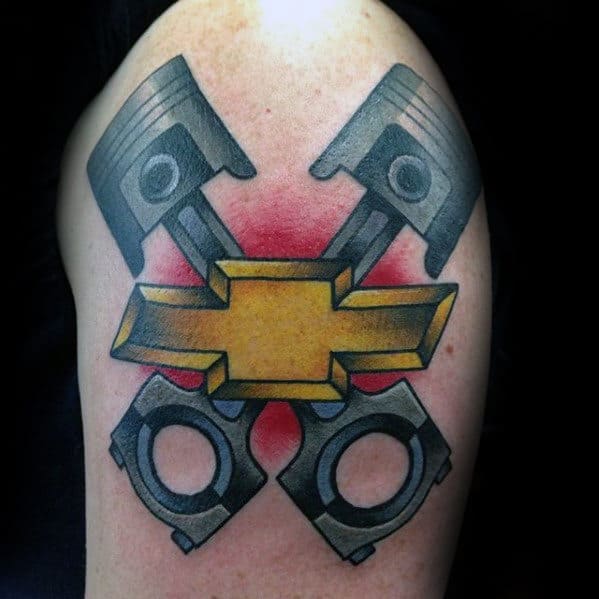 Guys Crossed Pistons With Chevy Logo Traditional Upper Arm Tattoo