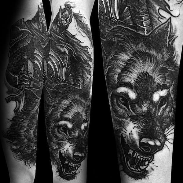 Black and grey Dark Souls tattoo of Artorias the Abysswalker and Great Grey Wolf Sif in a fierce, detailed forearm design.