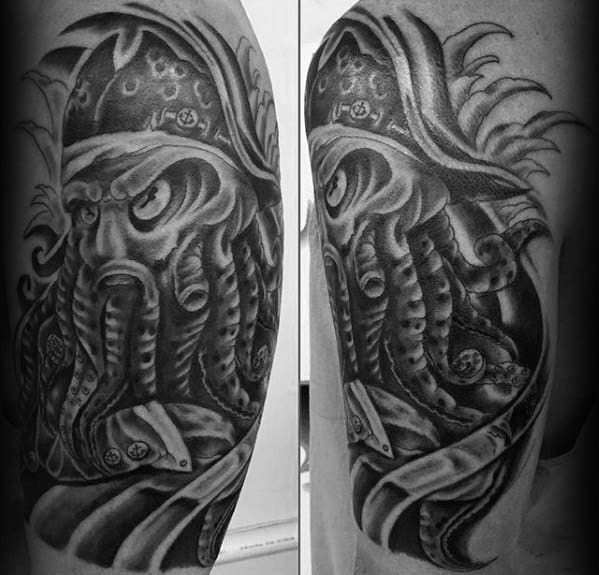 Black and gray tattoo of a Cthulhu-like creature with Davy Jones's tentacles on an arm