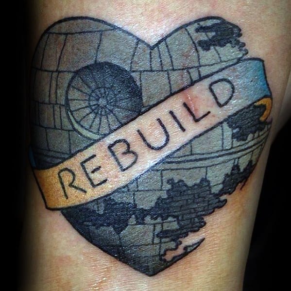 Heart-shaped Death Star tattoo with a "Rebuild" banner