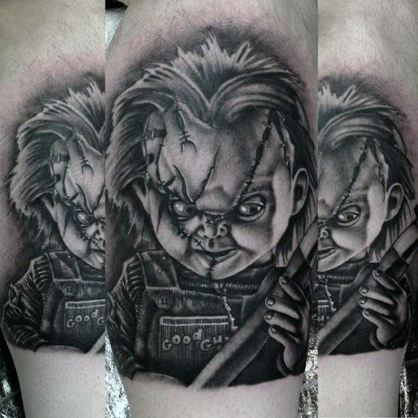 Black and grey tattoo of Chucky from *Child’s Play*, featuring his stitched face, sinister grin, and eerie shading for a haunting horror design.