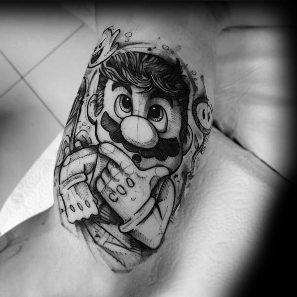 Black and gray Mario tattoo with intricate shading, depicting him in deep thought with a steampunk-inspired twist and detailed mechanical elements.