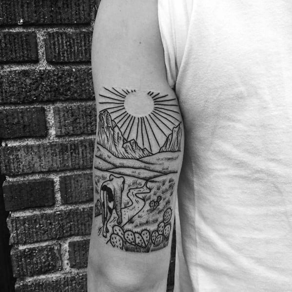 Minimalist hiking tattoo of a traveler on a winding trail with mountains, cacti, and a radiant sun, symbolizing adventure and exploration.