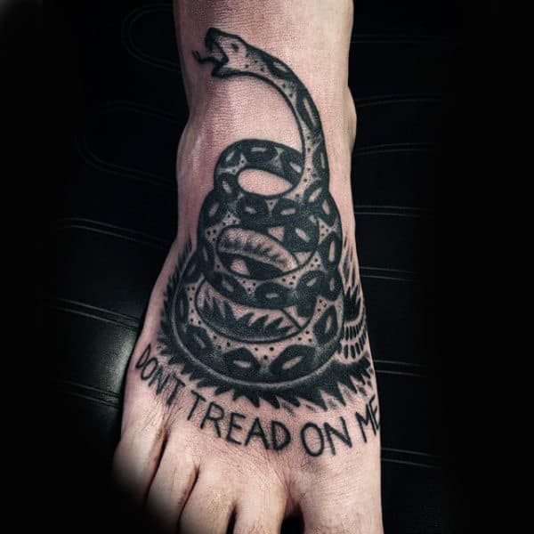 Guys Dont Tread On Me Text And Coiled Snake Foot Piece In Black Ink Tattoo