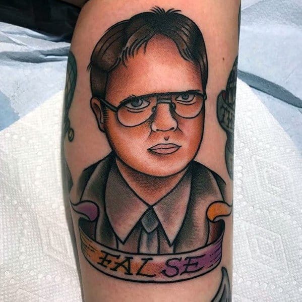 Color tattoo of Dwight Schrute with bold outlines and shading, featuring a banner below him with the word "FALSE" in capital letters.