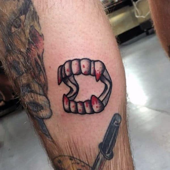 Guys Filler Leg Vampire Fangs With Blood Tattoo Design Ideas