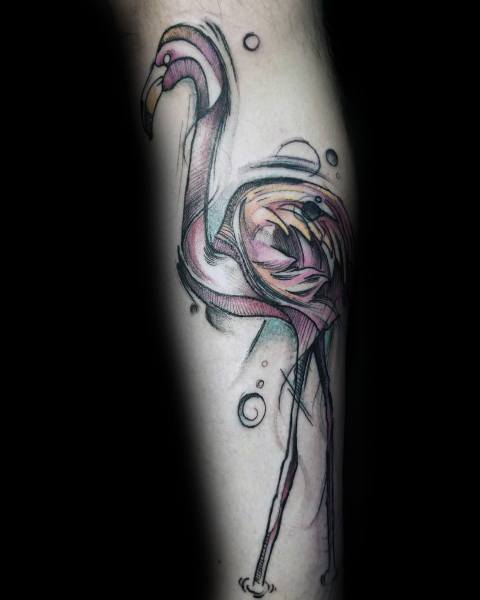 Artistic flamingo tattoo with a watercolor and sketch-style blend, featuring soft pink hues, fluid lines, and whimsical abstract details.