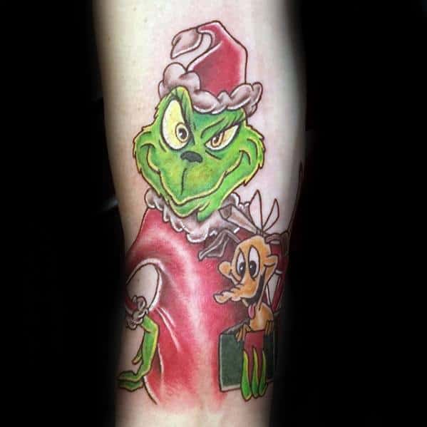 Grinch in his red Santa outfit, with a mischievous expression, accompanied by a small character, in vibrant colors, creating a playful and festive tattoo design.
