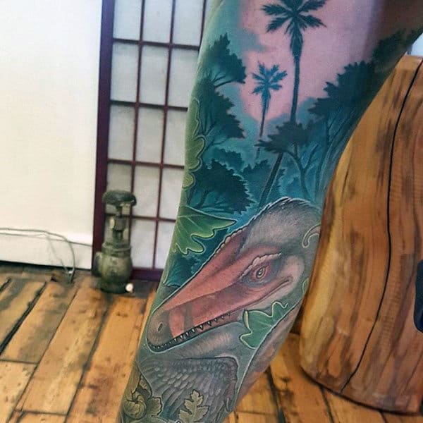 Guys Forearms Stunning Dinosaur In Green Forest Tattoo