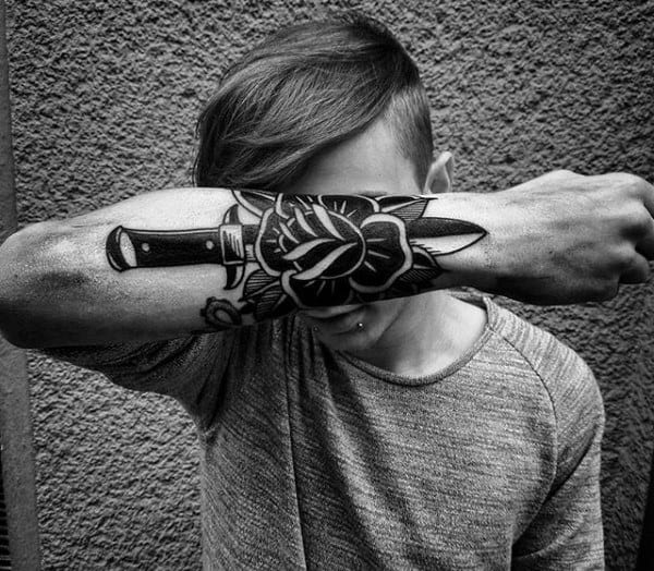 Guys Forerarms Dagger And Floral Tattoo