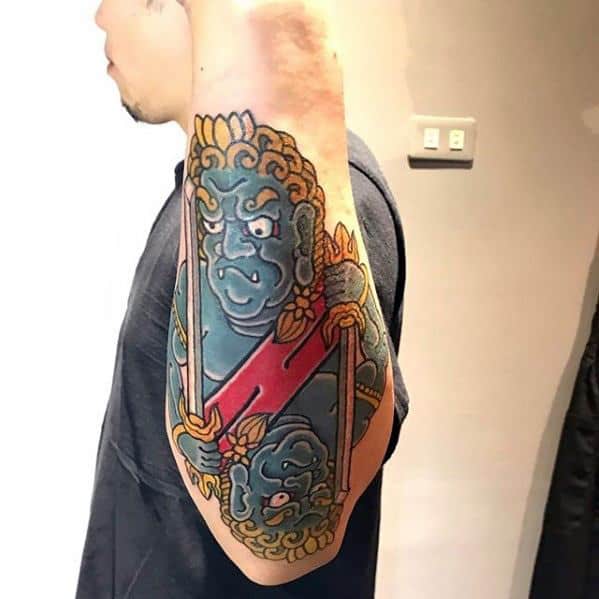 Guys Fudo Myoo Tattoos On Outer Forearm