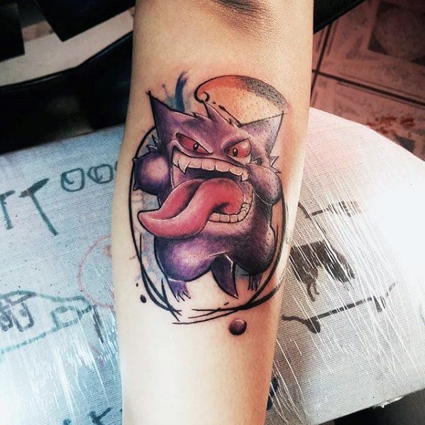 Dynamic Gengar tattoo with wild expression, extended tongue, and bold sketch-style lines blending realism with watercolor effects.