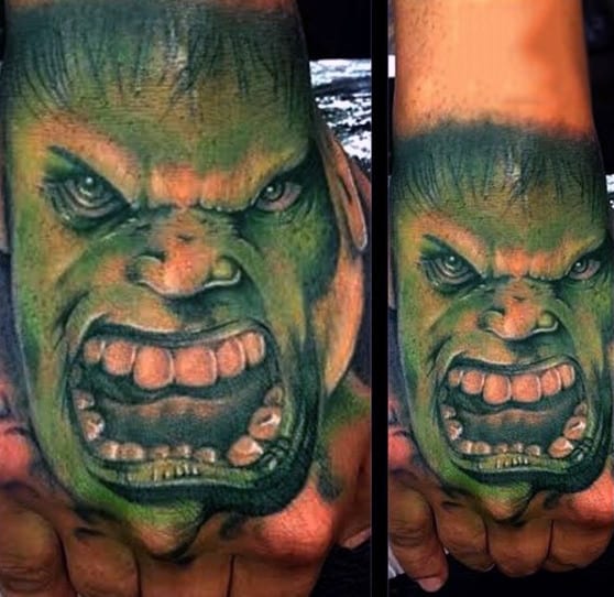 Guys Hands Open Mouthed Hulk Tattoo