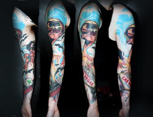 Colorful Hunter S. Thompson full-sleeve tattoo featuring his melting face, aviator glasses, bats, and Las Vegas-inspired elements in a surreal style.
