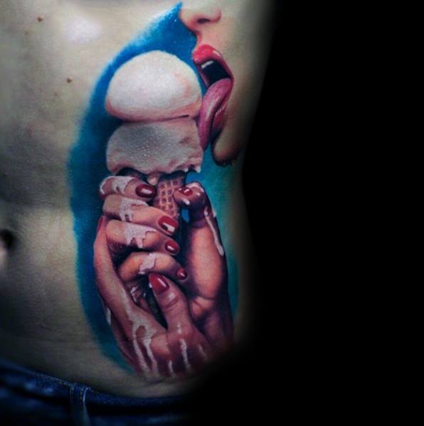 Hyper-realistic tattoo of a melting ice cream cone held by detailed hands with red nails, as a tongue licks the scoop, set against a blue background.