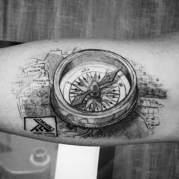 Detailed compass tattoo overlaid on a marathon course map with “26.2,” symbolizing direction, endurance, and a runner’s journey.