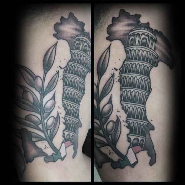 Black and grey tattoo of Italy's map featuring the Leaning Tower of Pisa, an olive branch, and subtle Italian flag colors at the base.