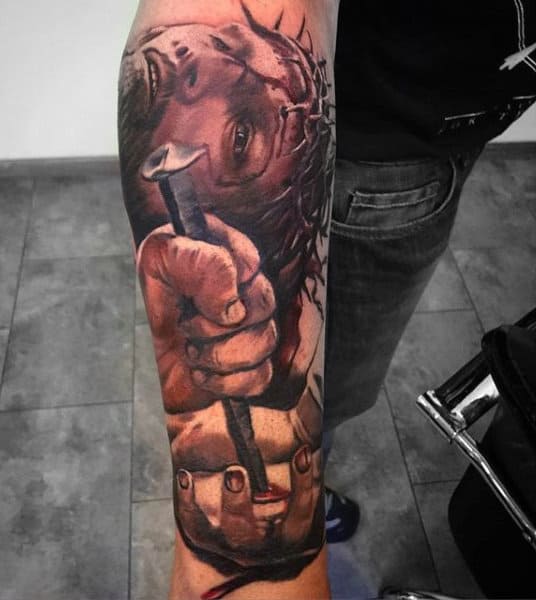 Guys Jesus Hand Tattoo With Nail In Cross On Forearm