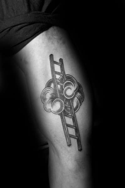Artistic ladder tattoo surrounded by clouds, symbolizing reaching for dreams, great for men's thighs or upper arms.
