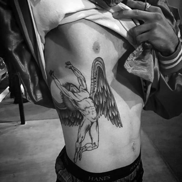 Side torso tattoo of the iconic winged Icarus figure in mid-flight, inspired by Led Zeppelin’s Swan Song Records logo.